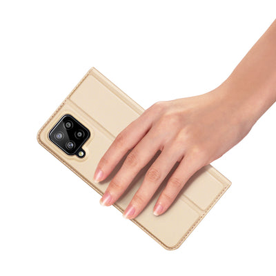 Dux Ducis Skin Pro Bookcase type case for Samsung Galaxy A22 4G golden