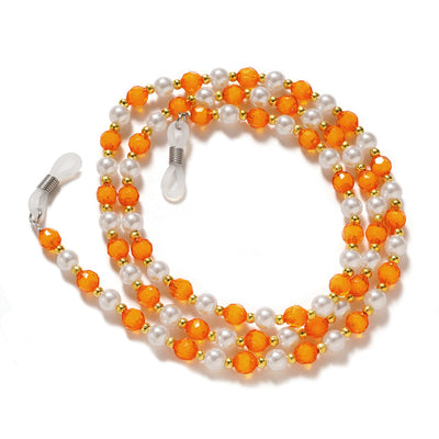 A chain for glasses, beads, an orange pendant — Hurtel
