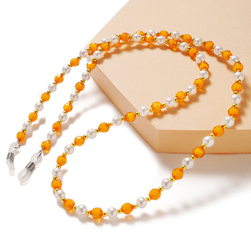 A chain for glasses, beads, an orange pendant — Hurtel