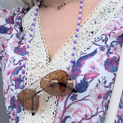 A chain for glasses, beads, an orange pendant — Hurtel