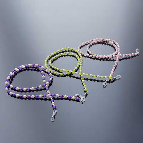 A chain for glasses, beads, an orange pendant — Hurtel